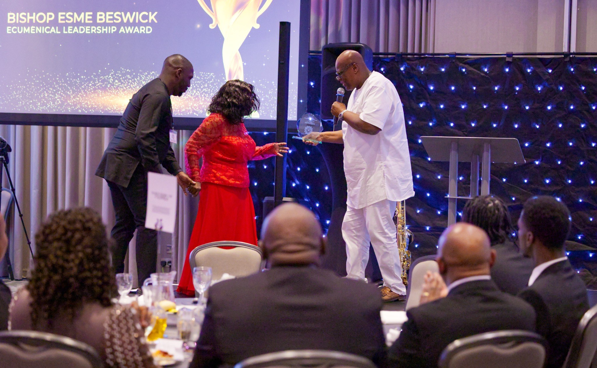 Bishop Esme Beswick receiving the Ecumenical Leadership Award